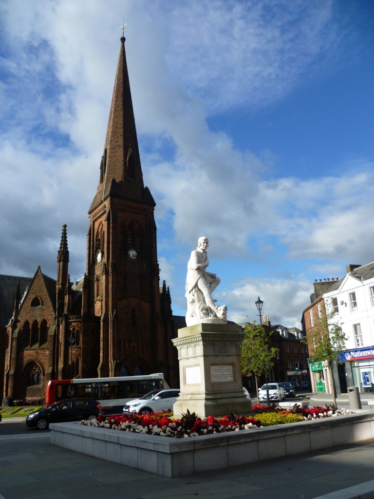 Dumfries town centre on a sunny afternoon.